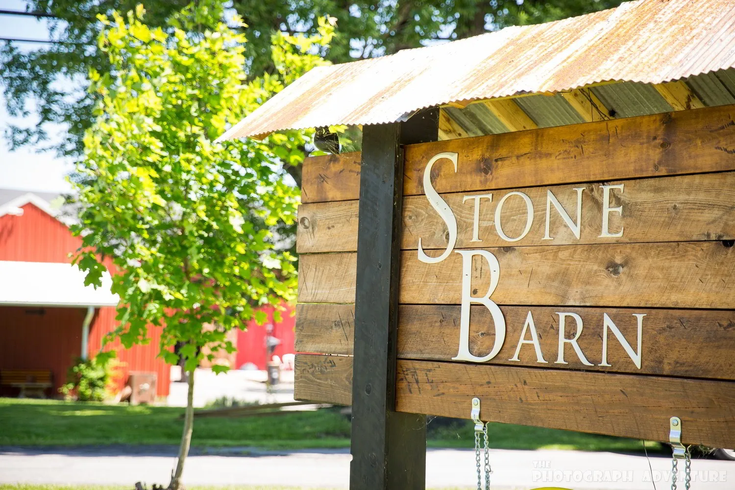 Stone Barn Farm and Vineyard Logo